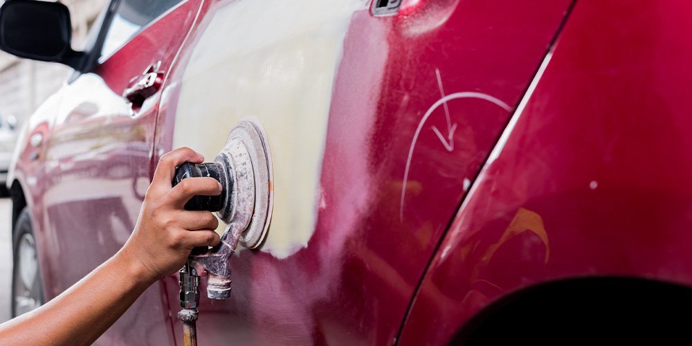 Image Of Technician Fixing The Car Door